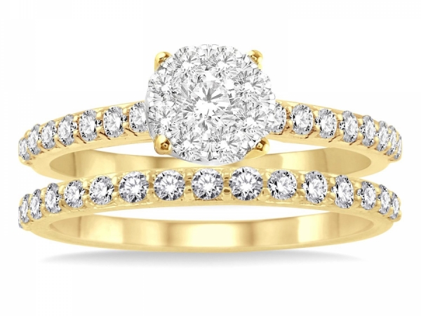 14 karat yellow gold engagement ring with matching wedding band - 14 karat yellow gold engagement ring with matching wedding band,  both rings have .85 carats total weight of natural multi diamonds both rings, with a color grade of  "F" to "G", clarity grade of SI-1 to SI-2,