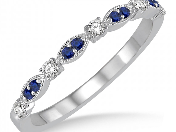 14 karat white gold diamond and blue natural sapphires* - 14 karat white gold ring with .15 carat total weight natural diamonds and blue natural sapphires* 
"H-I" SI1-2 finger size 6.5
*standard indusrty enchancements for sapphires